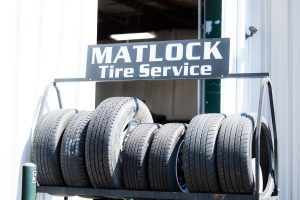 matlock tire service sign and rack of tires